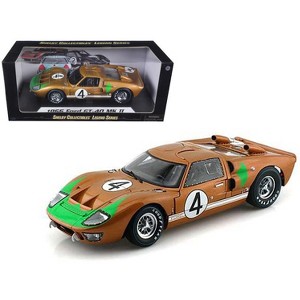 1966 Ford GT-40 MK 2 Gold #4 1/18 Diecast Model Car by Shelby Collectibles - 1 of 3