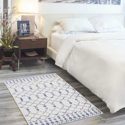 Ivory Geometric Synthetic 3' x 5' Boho Area Rug