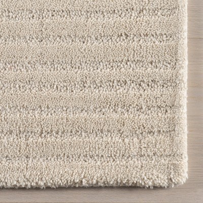 Handmade Beige Wool Rectangular Area Rug with Subtle Stripes