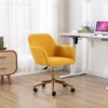 This swivel office chair is height-adjustable, has wheels, gold-plated legs, and a chrome-plated base. - 3 of 4