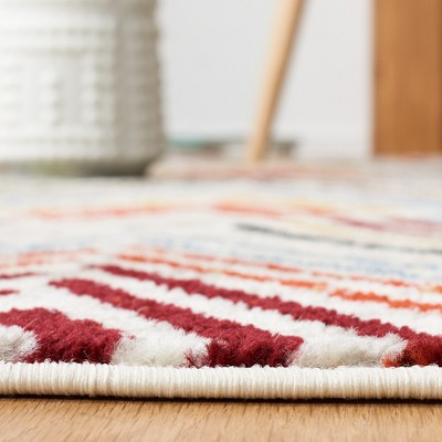 Ivory and Red Geometric Synthetic Rectangular Area Rug