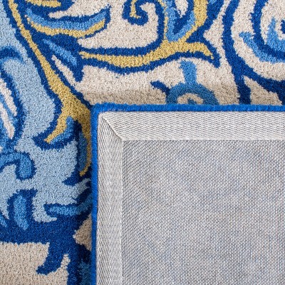 Empire Blue and Ivory Hand-Tufted Wool Area Rug