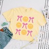 Simply Sage Market Women's Bows and Smiley Coquette Chart Short Sleeve Relaxed Fit Cropped Graphic Tee - S - Butter - image 3 of 3