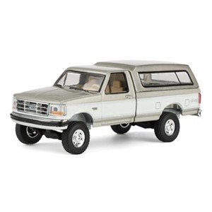 Greenlight 1/64 1997 Ford F-250 4x4 Pickup Truck with Bed Cap Rick's Auto Sales, LP Diecast Exclusive 51625 - 1 of 4