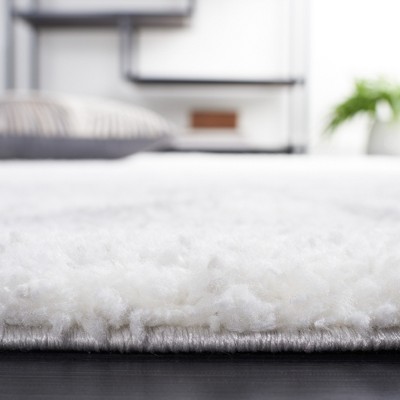 Ivory and Grey Synthetic Shag Area Rug 4'5" x 6'5"