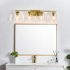 Elegant Lighting Merrick 4 light Brass and Clear Bath Sconce - 3 of 4