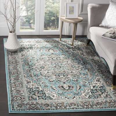 Boho Chic Blue Medallion 59" Synthetic Area Rug