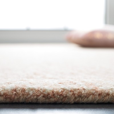 Ivory and Brown 4' x 6' Hand-Tufted Wool Abstract Area Rug
