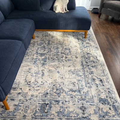 Ivory and Navy 8' x 10' Synthetic Oriental Area Rug