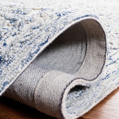 Elegant Hand-Tufted Wool Rectangular Rug in Ivory and Blue