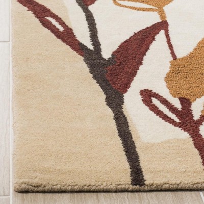 Ivory and Multicolor Floral Hand-Tufted Wool Area Rug, 4' x 6'