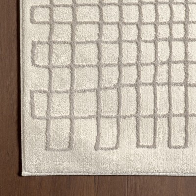 Ivory Geometric 4' x 6' Machine Washable Area Rug