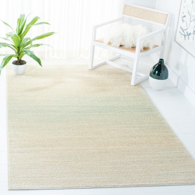 Green and Ivory Hand-knotted Synthetic 6' x 9' Area Rug