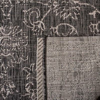 Safavieh Courtyard Black and Ivory Synthetic Indoor/Outdoor Area Rug