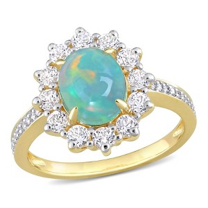 EVERLY JEWELRY | Yellow Silver 2 1/6 ct TGW Oval Shape Blue Ethiopian Opal and White Topaz and 1/10ct TDW Diamond Halo Ring - 1 of 4