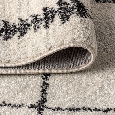Zaina 8' x 10' Black and Cream Geometric Synthetic Area Rug