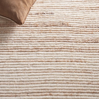 Beige and Ivory Handwoven Wool Shag Area Rug 3' x 5'
