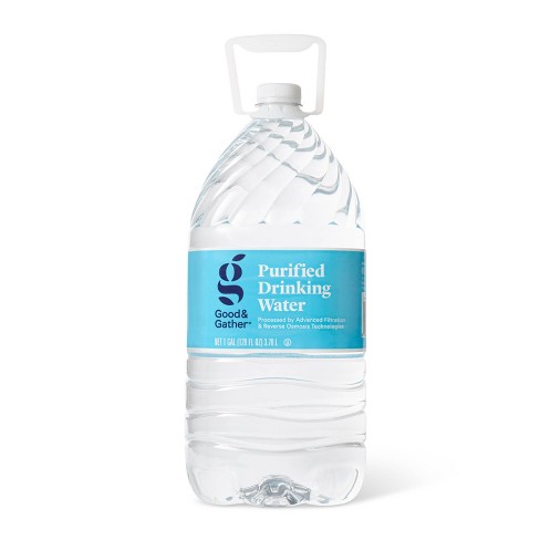 Water bottle. Large bottle of purified drinking water on white
