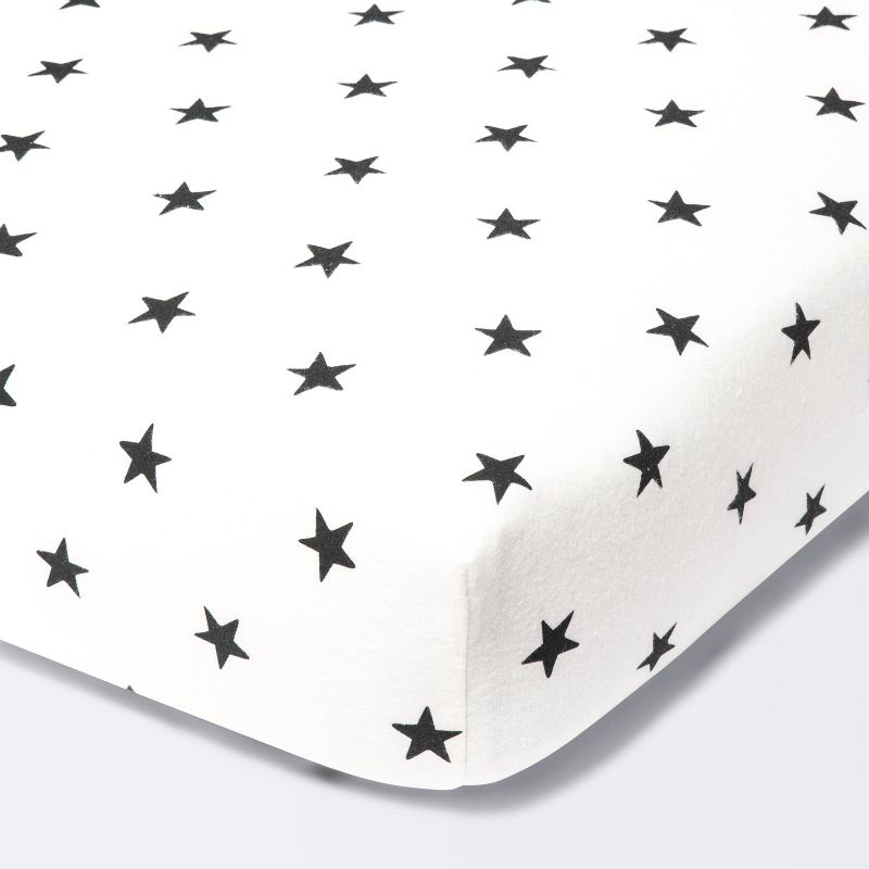 Flannel Fitted Crib Sheet Stars - Cloud Island&#8482; - Cream/Black, 1 of 7