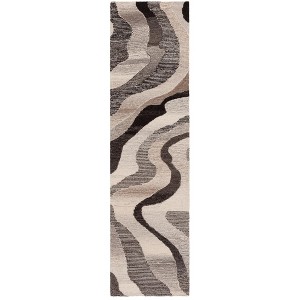 Ebony EBN529 Hand Tufted Indoor Rugs - Safavieh - 1 of 4
