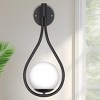 DORESshop 7.87 in. 1-Light Black Modern Globe Wall Sconce with Frosted Glass Shade - 3 of 4