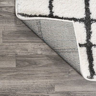 Ivory and Black Moroccan-Inspired Geometric Shag Rug
