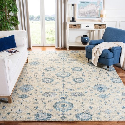 Hand Tufted Silver and Blue Wool Floral Area Rug - 5' x 8'