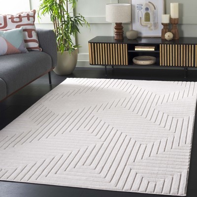 Ivory Geometric Synthetic Rectangular Area Rug 5'3" x 7'6"