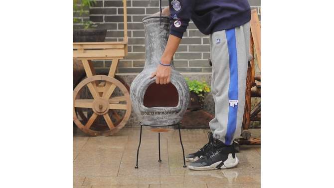 Vintiquewise Outdoor Stoney Grey Clay Chimenea Scribbled Design Fire Pit with Metal Stand, 2 of 9, play video