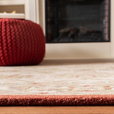 Handmade Floral Elegance Wool Area Rug 6' x 9' in Beige and Rust