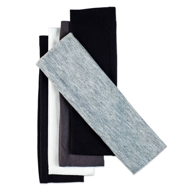 Four headbands in black, white, gray, and light gray colored fabric are stacked together.