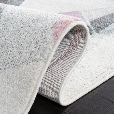 Ivory and Pink Geometric Floral 4' x 6' Synthetic Area Rug