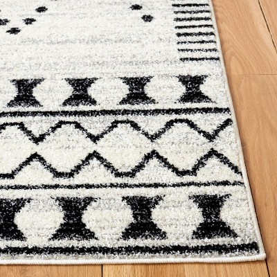 Boho-Chic Black and Ivory Hand-Knotted Round Area Rug