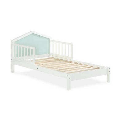 white wooden toddler bed