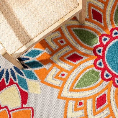 Ivory and Orange Floral Synthetic Easy Care Rug, 5' 3" x 7' 7"