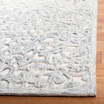 Ivory Hand-Tufted Wool 4' x 6' Area Rug