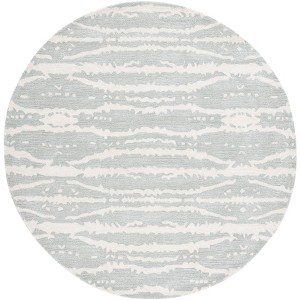Soho SOH656 Hand Tufted Area Rug  - Safavieh - 1 of 4