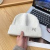 Anna-Kaci Women's Ribbed Knit Beanie Hat with Folded Cuff and Metal Bow Accent for Casual Looks - 2 of 3