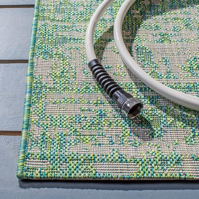 Courtyard Blue Ivory 8' x 10' Easy-Care Synthetic Area Rug