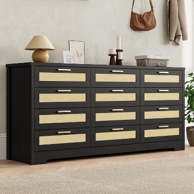 Full view of the black 12-drawer dresser in a room setting
