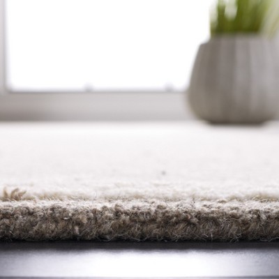 Ivory and Beige Abstract Hand-Tufted Wool Rug, 5' x 8'