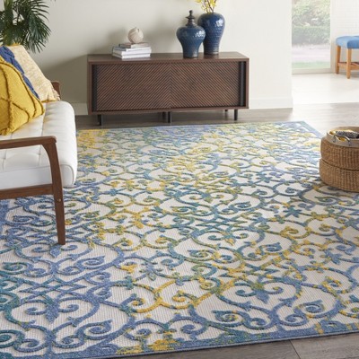 Ivory Blue Floral Synthetic Rectangular Indoor/Outdoor Rug 7' x 10'