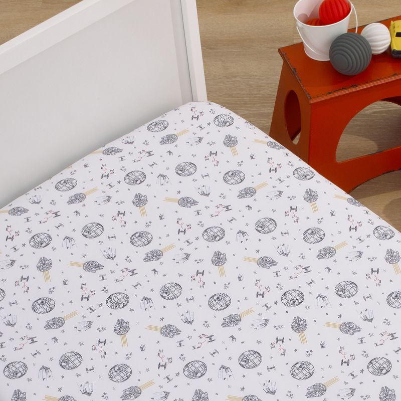 Star Wars May The Force Be With You White and Gold Millennium Falcon and Death Star Nursery Fitted Crib Sheet, 2 of 6