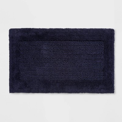 navy and white bath mat