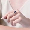 Guili Elegant Sterling Silver 14K Gold-Plated Bypass Ring with Emerald Cubic Zirconia for a Chic, Timeless Sparkle. Green or Blue, Sizes 6-8. - 3 of 3