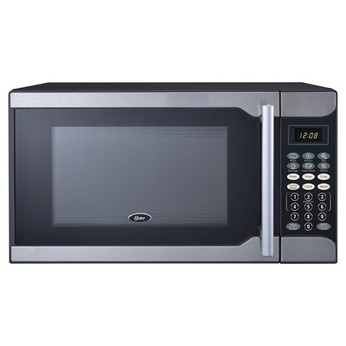 Oster 0 7 Cu Ft 700 Watt Microwave Oven Stainless Steel Target