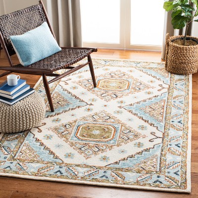 Ivory Hand-Tufted Wool 4' x 6' Rectangular Area Rug