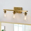 Dewdrop Industrial 3-Light Vanity Light in Brushed Brass Finish with Clear Glass Shades for Bathroom - 2 of 4