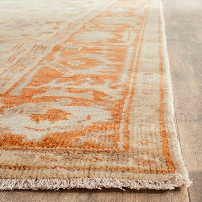 Ivory and Rust Hand-Knotted Wool Floral Area Rug 6' x 9'