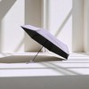 Unique Bargains Umbrella 6-Rib Flat 50% Fold Mini Parasol Full Shading-Sun Protection Impact Cloth 34.25"x20.47" 1 Pcs - 2 of 4